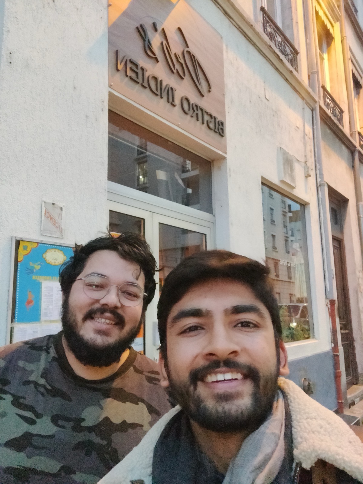 Manan Mehta outside an Indian bistro in France