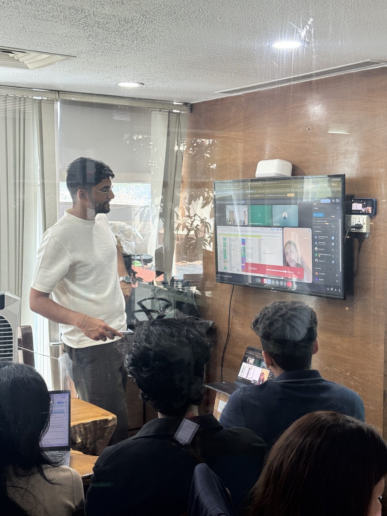 Manan Mehta presenting to the team in the Mumbai office