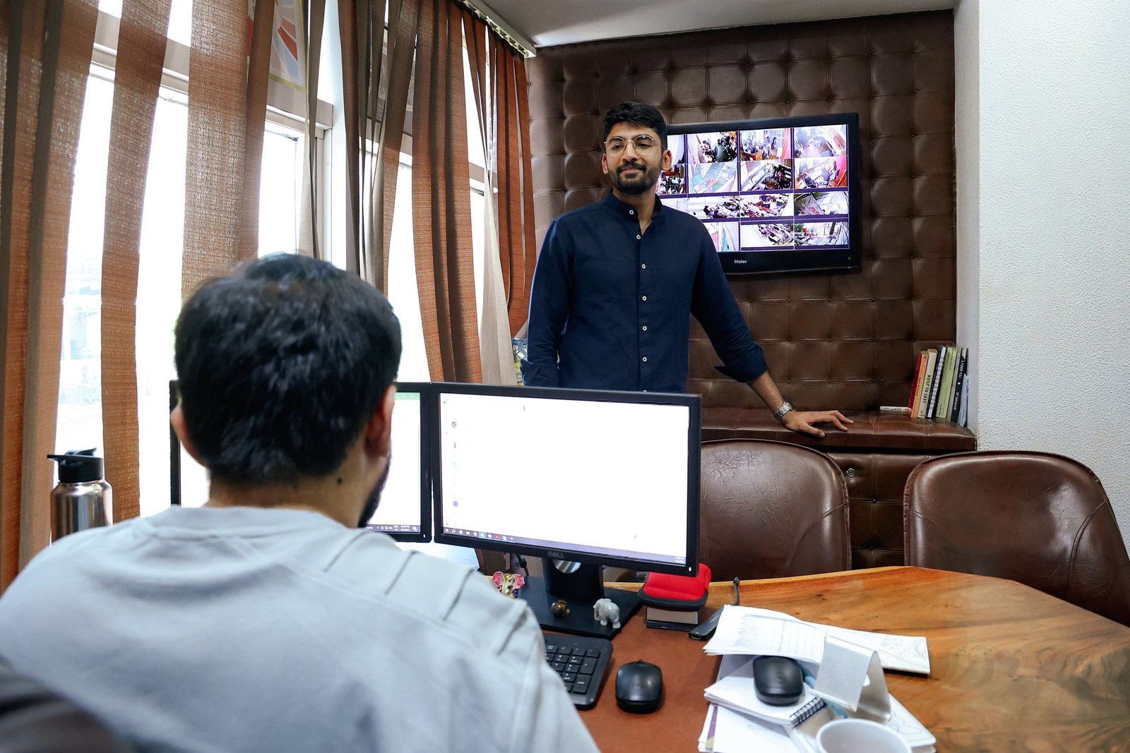 Manan Mehta presenting campaign performance on screen
